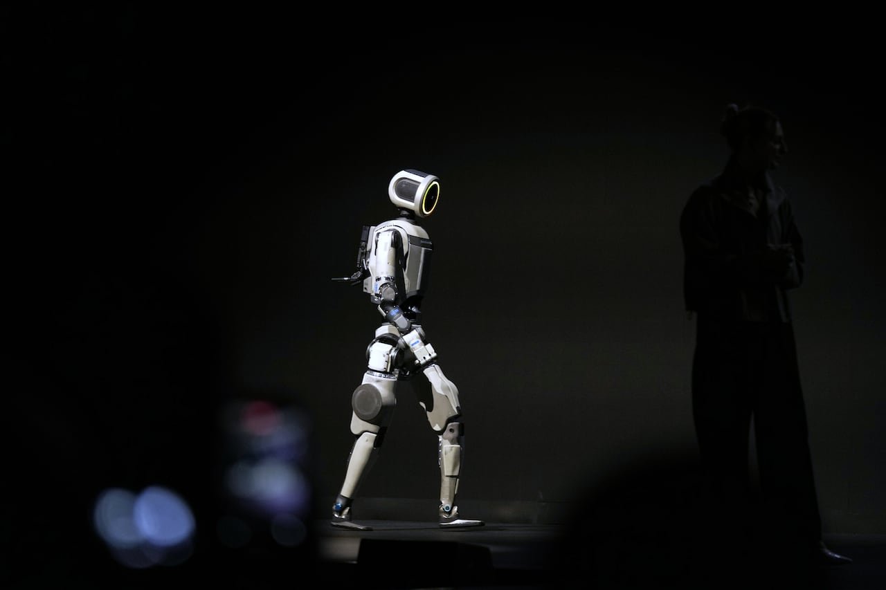 default-514 A walking robot on stage.
