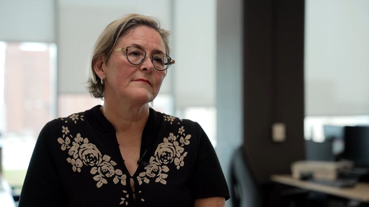 A woman wearing glasses