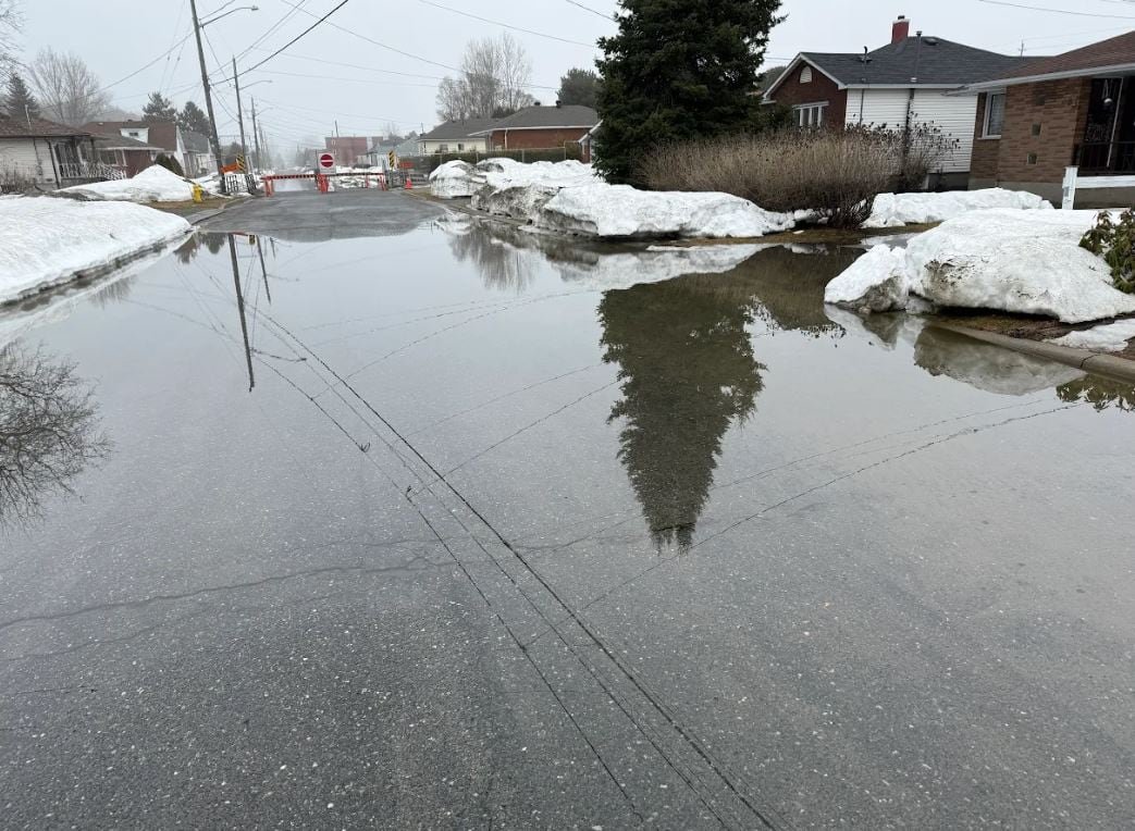 a residential street submerged in water